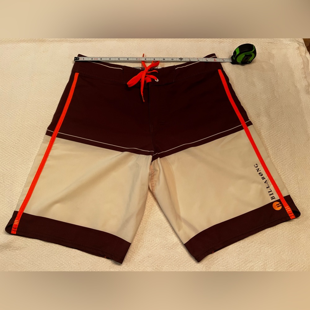 Billabong brown, white with orange used board shorts size 32